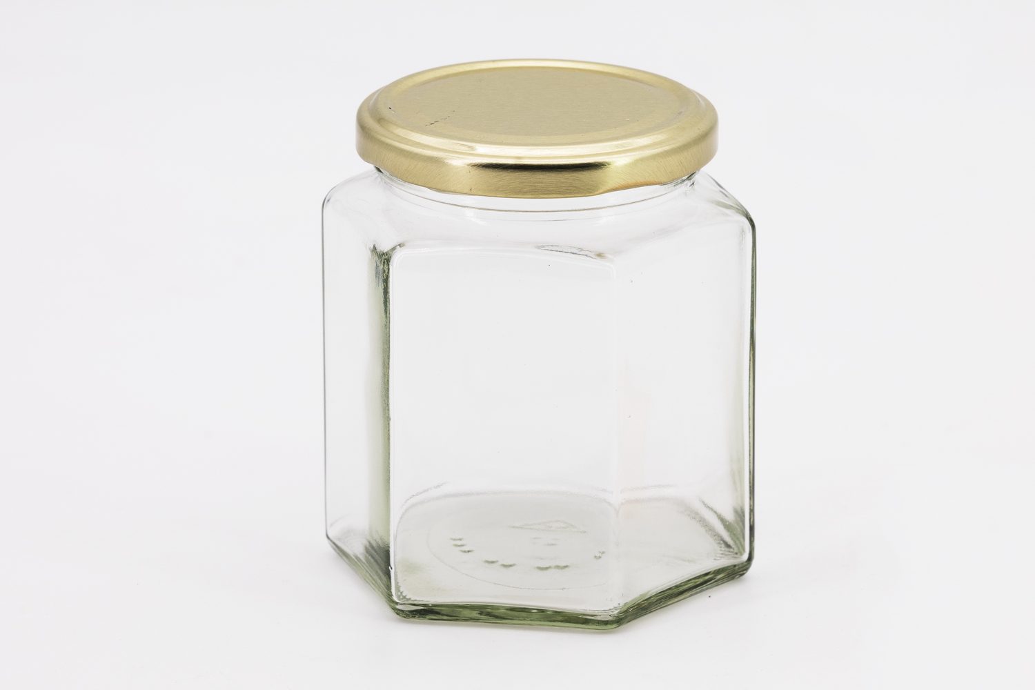 Sechseckglas 390 ml mit 70er gold