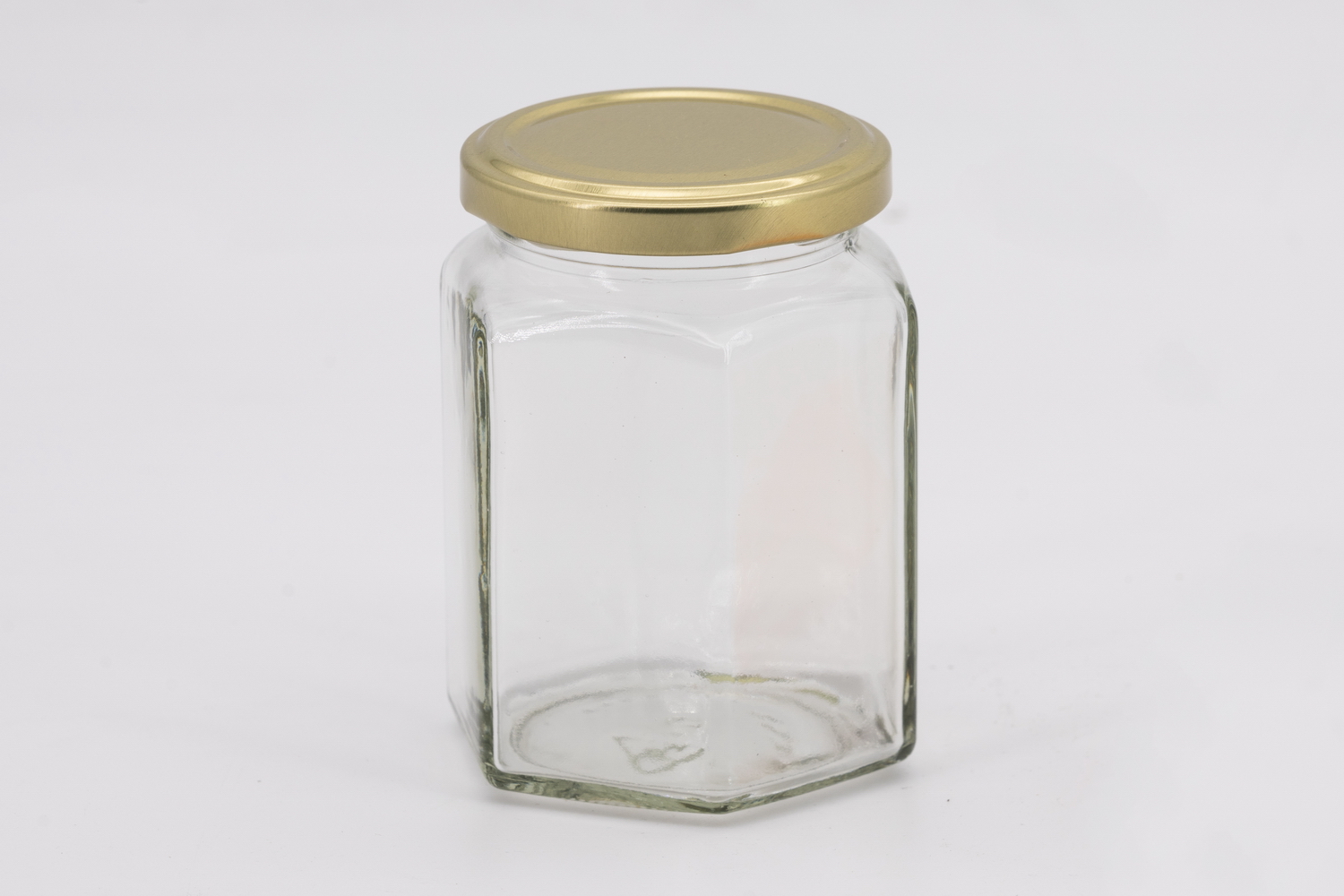 Sechseckglas 288 ml mit 63er gold