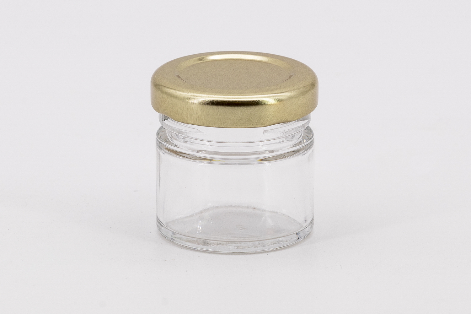 Round glass 30 ml with 43 gold