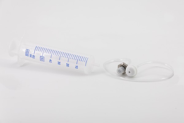 Intake set with dosing syringe