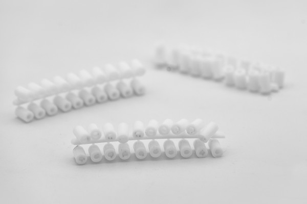 Plastic spacer rolls with nails